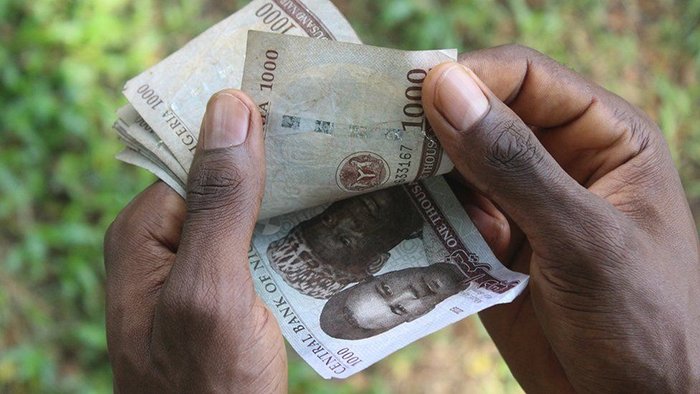 Đồng naira mất giá khiến nhiều người Nigeria tìm sang Bitcoin để giữ tiền. Ảnh: Getty Images.